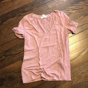 A pink v neck shirt from forever 21